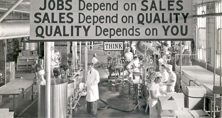 GARNER FOODS FACTORY, est late 1940s interior with workers and a motivational sign about jobs, sales, and quality.